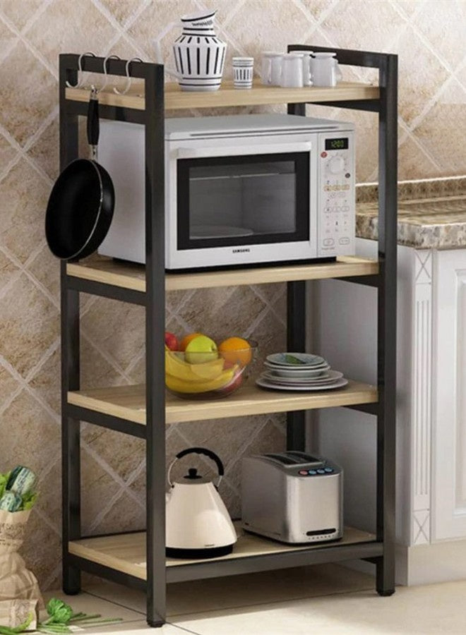 Kitchen shelf with microwave, fruits, and kitchen appliances against a tiled wall.
