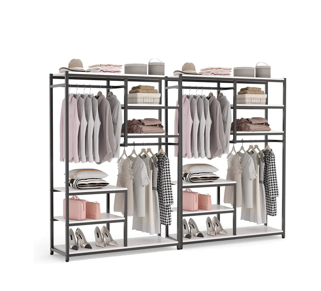 Clothing rack with clothes and shoes on a white background