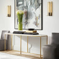 Modern interior design with a console table, chairs, and wall art.