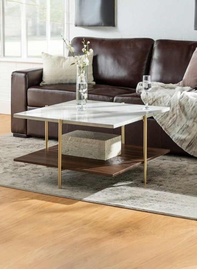 Living room with a brown leather sofa and marble coffee table.