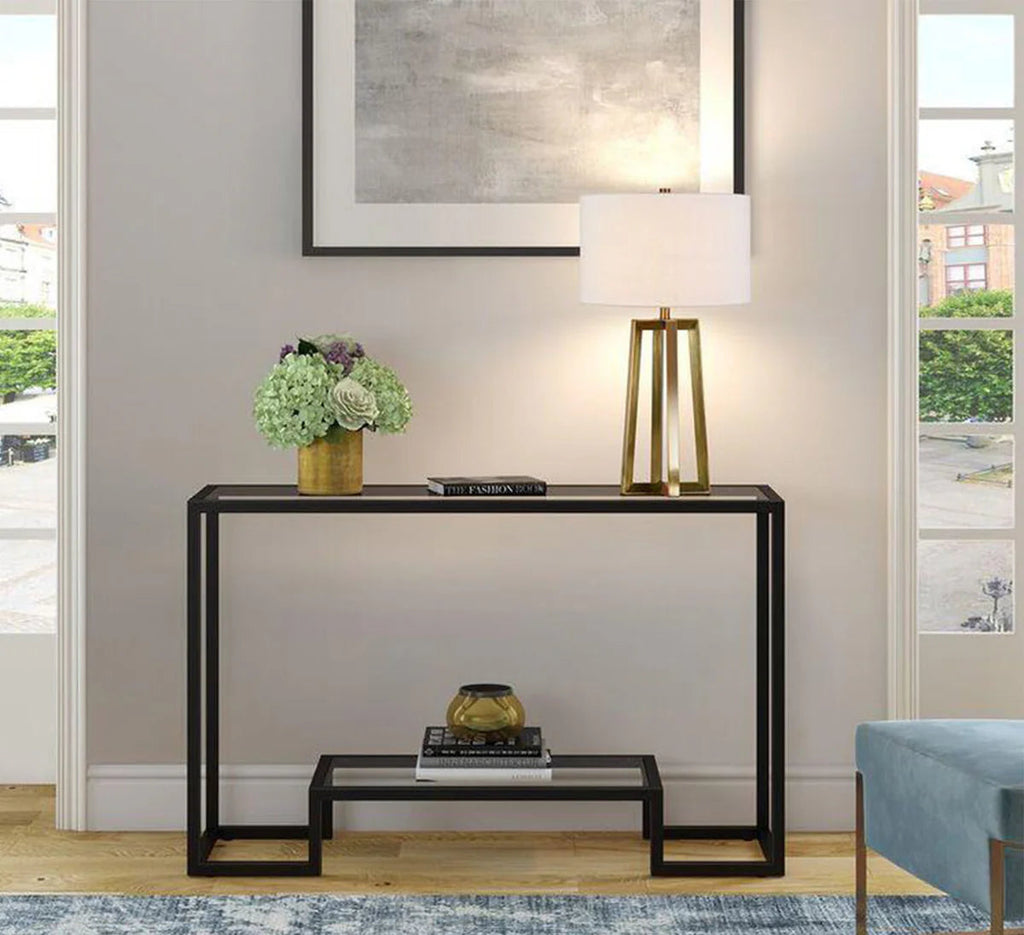 Console table with decorative items in a living room setting