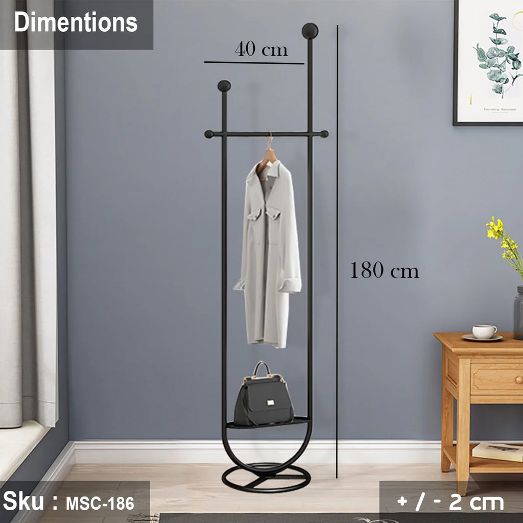 Black coat stand with dimensions labeled against a gray wall.