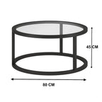 Black round coffee table with glass top and dimensions on a white background