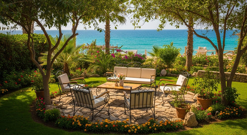 Outdoor patio area with chairs, table, and ocean view