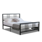 Black metal bed frame with white bedding and gray blanket on a white background