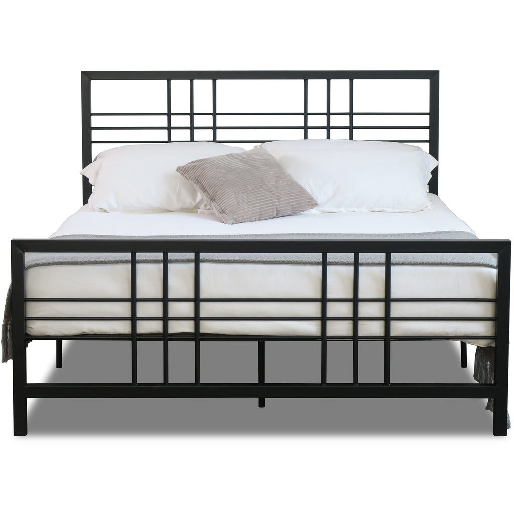 Black metal bed frame with white bedding on a white background