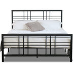 Black metal bed frame with white bedding on a white background