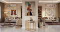 Luxurious living room with modern decor, including a large painting of an Egyptian goddess.