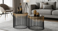 Two modern side tables with decorative items in a living room setting.